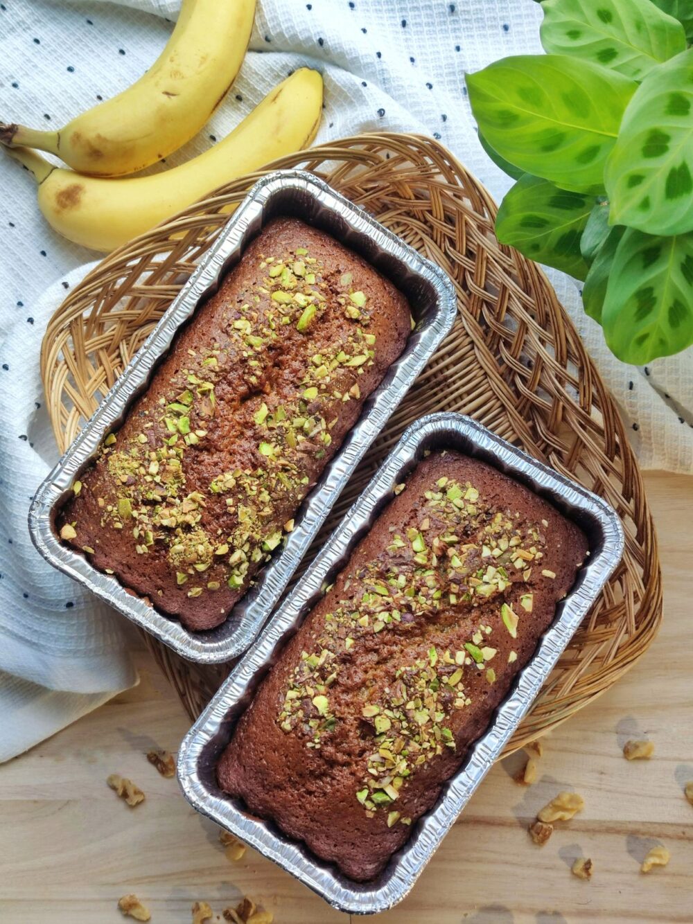 Easy moist banana bread recipe baked in loaf pans with golden crust