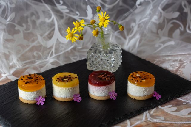 Mini no bake cheesecake bites with fruit glaze, an elegant no bake dessert recipe for beginners