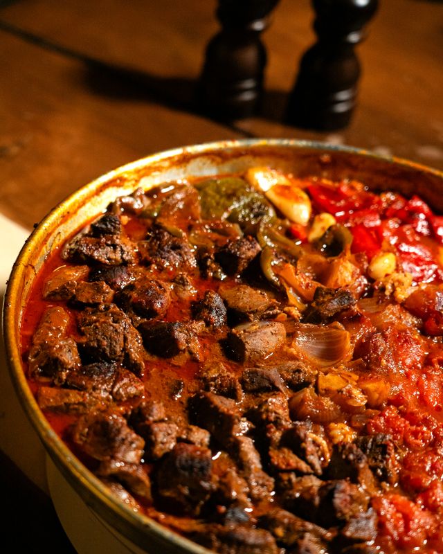 Delicious Mutton Kaleji Recipe served hot in a traditional pan, featuring tender pieces of spiced mutton liver in a rich, thick onion-tomato gravy with aromatic herbs and chilies. Perfect easy lamb liver recipe.