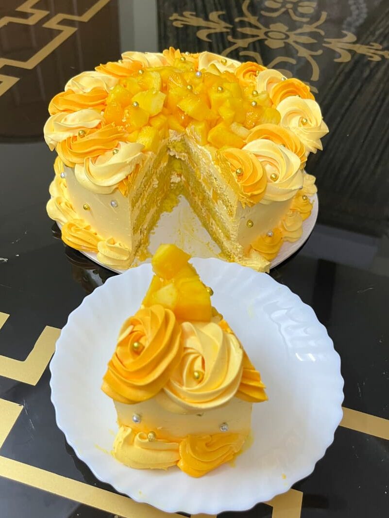 Mango Rosette Cake Recipe slice served on a plate showing soft sponge texture