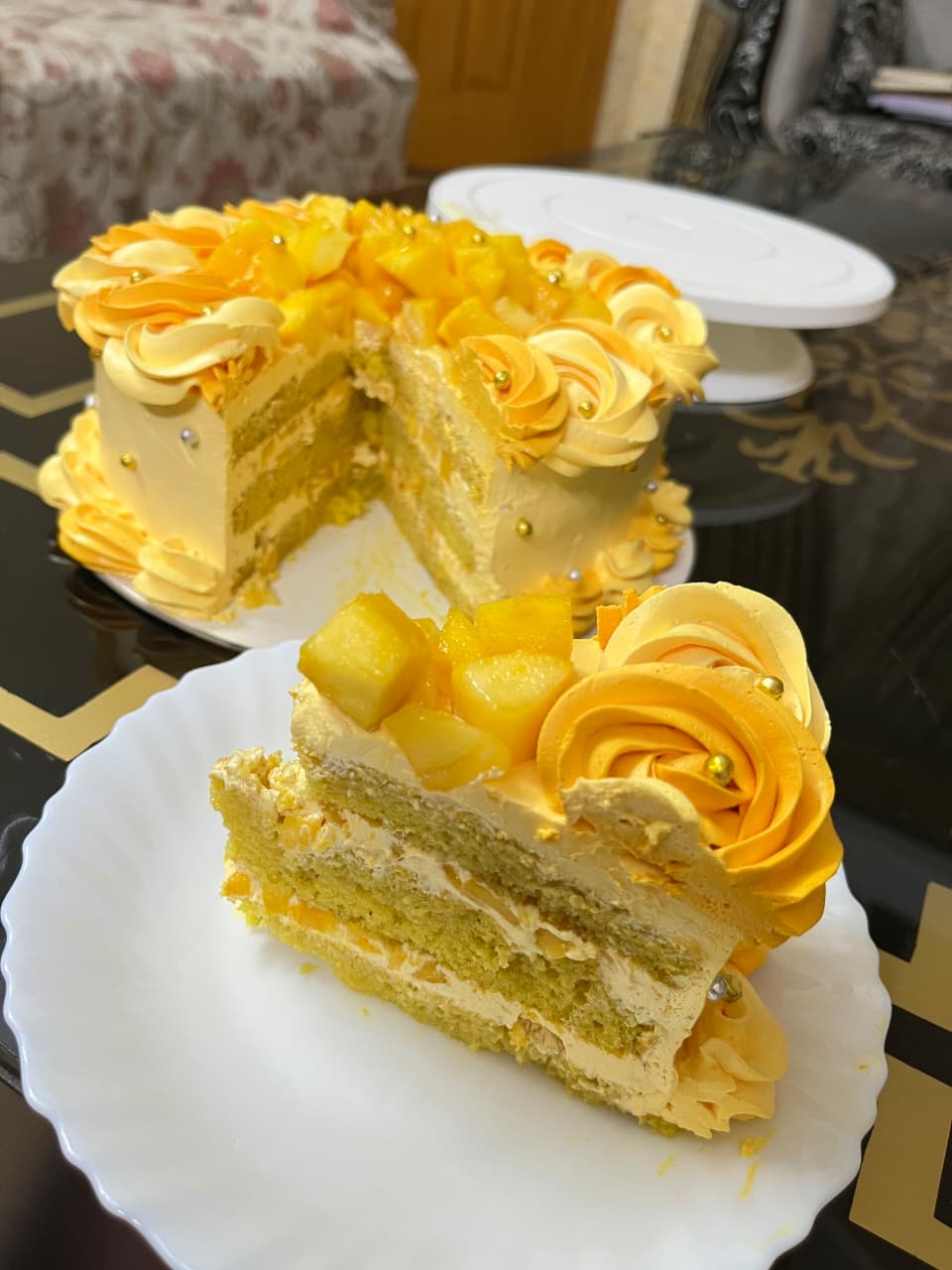 Mango Rosette Cake Recipe sliced to show moist mango layers and filling