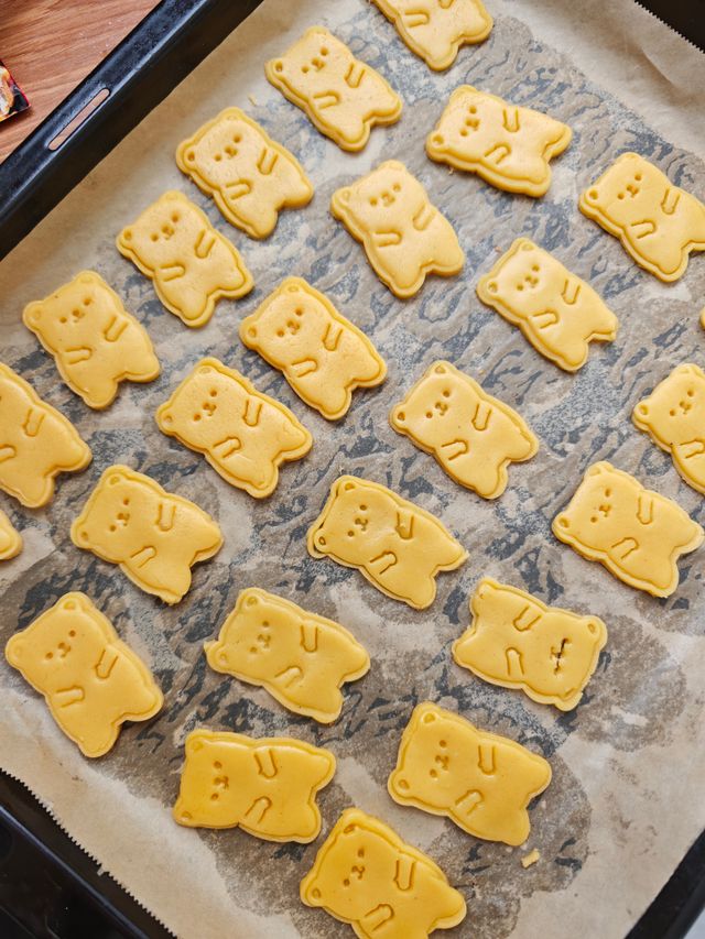 Animal shaped baked crackers for kids lunchbox on a baking tray